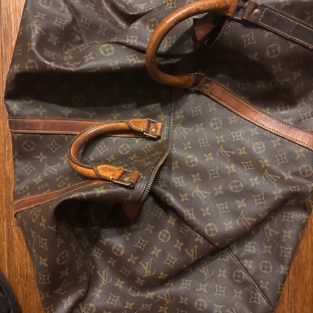 LV Carry On bag with zipper and leather straps Vintage